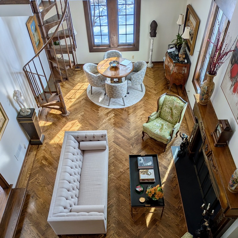 Herringbone in a 3"x21" pattern with a 1" Walnut feature strip and two board border.